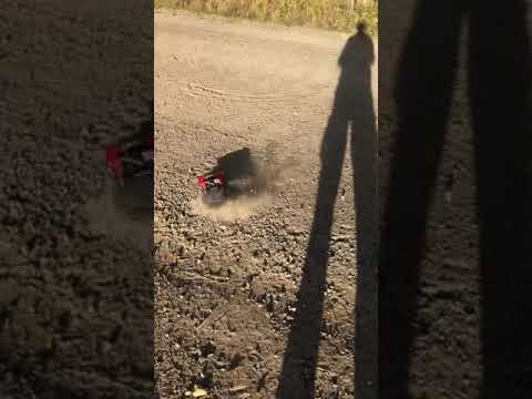 Traxxas slash 4x4 1/16 drifting on gravel