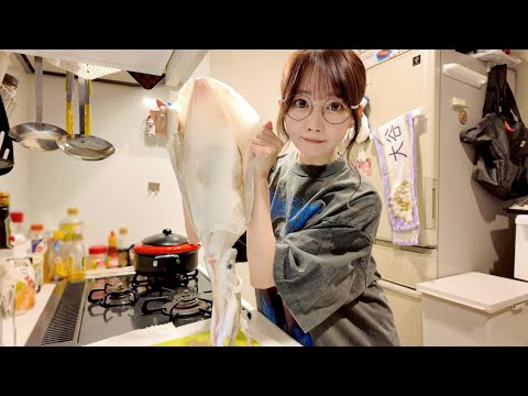 For some reason, Mirinya is butchering a giant bigfin reef squid