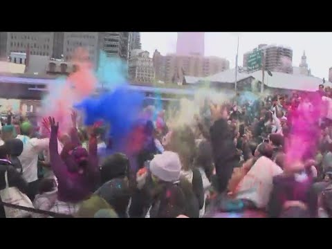 Hundreds celebrate Holi at colorful Seaport event