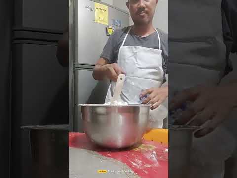 Mixing all ingredients for making a dough.