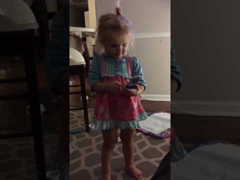Cute 2 yr old using cell phone