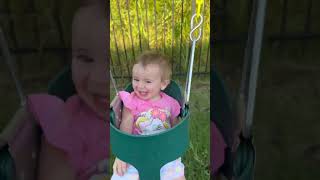 Baby chuckles and swings