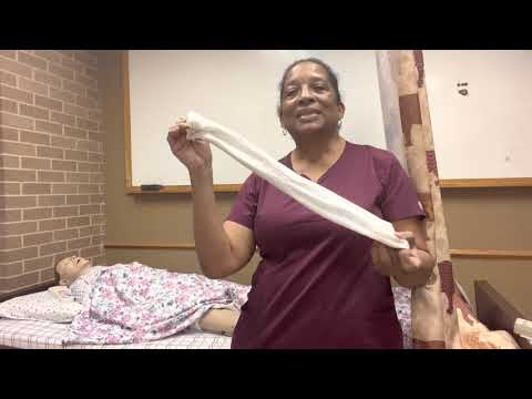Credentia Skill 2 Applying One Knee High Elastic Stocking Skill