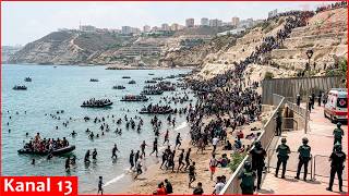 Crowd breaks through border from Spanish territory of Ceuta from Morocco