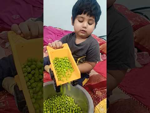 Toddler playing with Dump Truck Toy