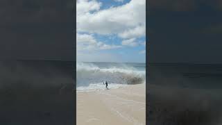 Clark Little Dives Into Massive Shorebreak Waves to Photograph Them