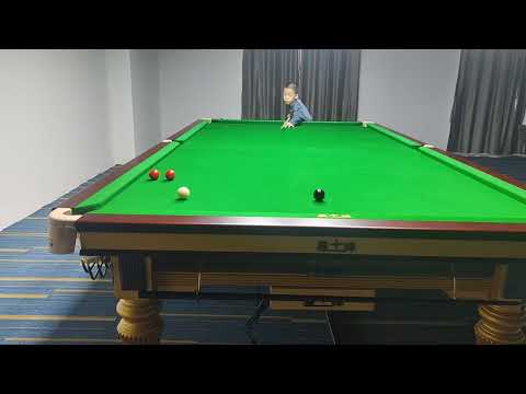 Training my 8 year old student Guan Hanlin at Yushan International Billiards Academy China