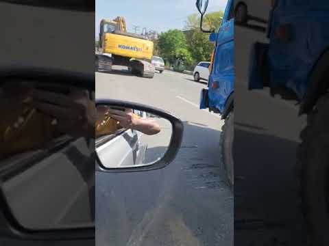 shadman lahore, local govt destroying road with the help of crane, intentionally.