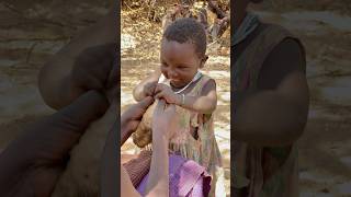 Love on the Land:😍 Hadzabe Kid Feeds His Mother🥰🥹