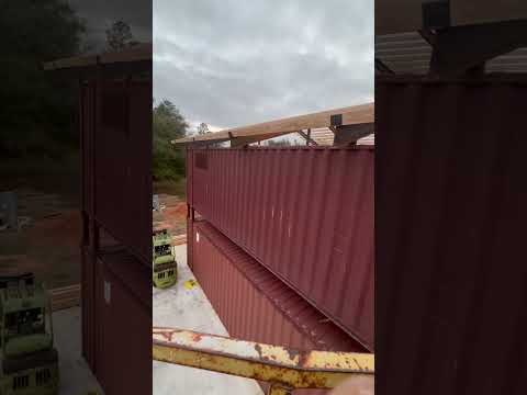 Shipping container home build. Roof is coming along nicely but trying to whoop me!