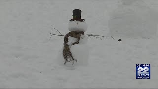 Hatfield family build over 50 snowman in yard, goal to make over 100