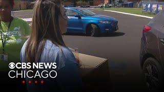NW Indiana residents line up for food giveaway amid power outages