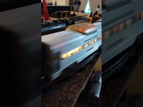 NP 759 pulling aluminum passenger cars