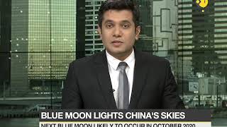 Rare celestial event: Blue moon lights China's skies