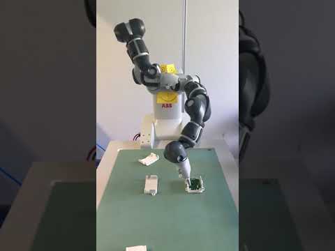 Yumi Robot assembling electronic communications device | RoboTAO