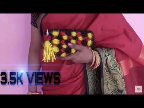 FANCY WOOLEN PURSE.......