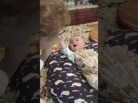 Baby talks to his Great Grandmother.