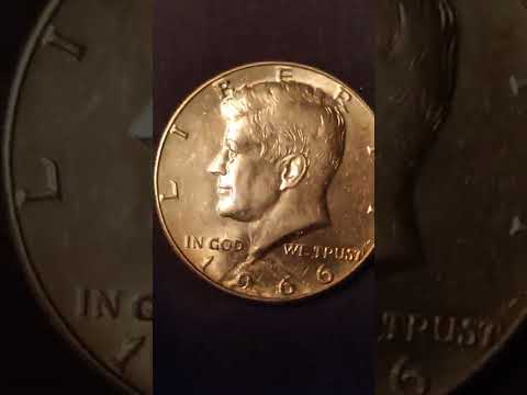 1966 Kennedy half "stuck thru?"