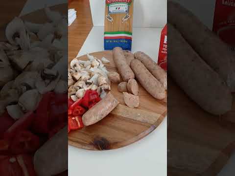 AUTHENTIC SPAGHETTI WITH IMPORT SAUCE FROM ITALY and Trader Joe's favorite Spicy Italian sausage