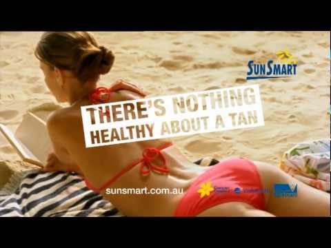 Dark Side of Tanning - girl at the beach