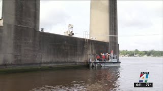 DOT workers inspect bridges for safety