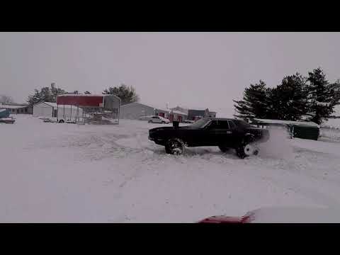 Mad Max Mustang does big snow burnout and donuts!