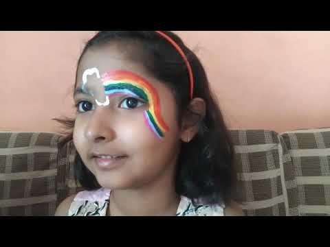 how to draw rainbow on face with paint.rainbo theme party for kids.how to draw rainbow on kids face