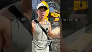 Rating wings at the World Famous House of Mac in Miami, FL