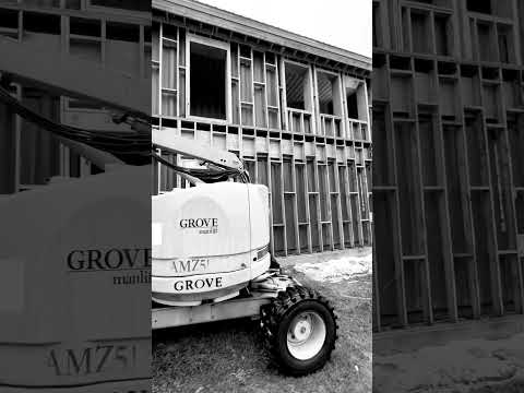 Framing walls in shipping container house.