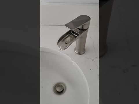 Review on the Yundoom Waterfall Bathroom sink faucet.  Brushed Nickel finish and a true waterfall!!