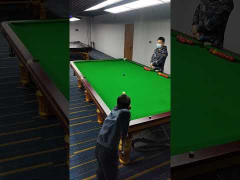 Training my 8 year old student Guan Hanlin at Yushan International Billiards Academy China