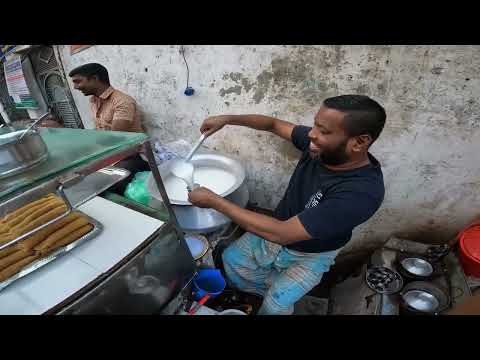 Bangladesh, pitha shops are like a festival fair in the busy city in the morning and evening |