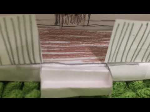 Paper house with 15 windows,1 garage, and back door,front door