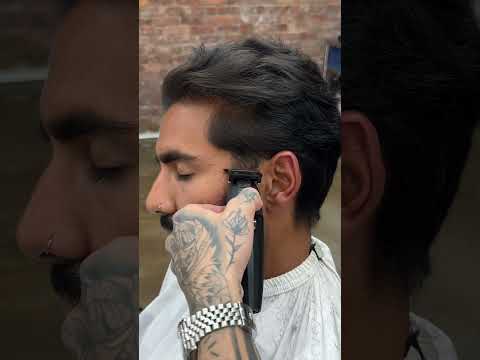 Cutting off my clients ponytail and giving him a modern brushback style, still keeping plenty length