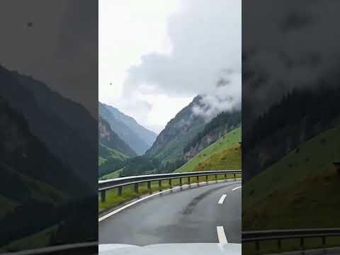 Monsoon Magic on the Mountain Roads - Raindrops, winding roads, and the misty embrace of nature.