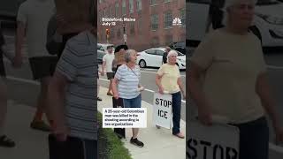 Protesters hold a vigil for the victim of the ICE shooting in Maine