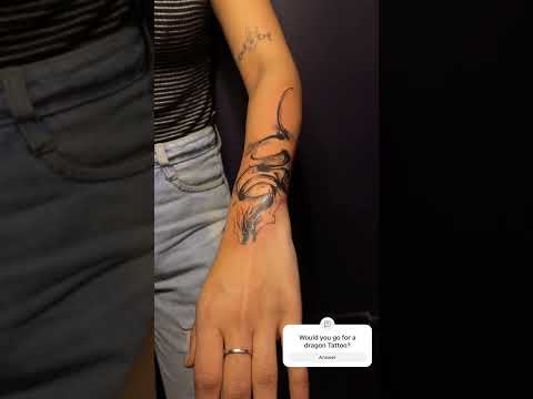 Abstract dragon hand tattoo crafted at Micro Tattoo Studio. #art #tattoo #tattooideas #tattooartist