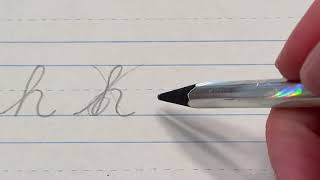 Lowercase "h" in cursive