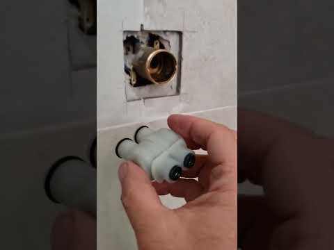 How to repair a Delta Monitor series leaky shower valve, adjust temperature, and disassemble parts.
