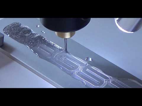 Engraving of aluminum logo on CNC Wegstr