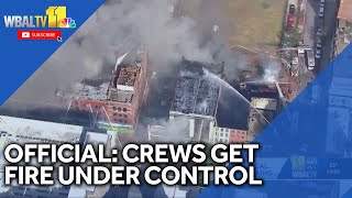 Crews get massive, 5-alarm fire under control, official says