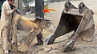 The Efficient Process Of a Hardworking Mechanic To Restore The Malfunction Of a Trench Bucket