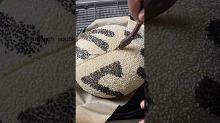 Black and white sesame seed covered boule. 100% satisfying. #sourdoughart #bread #sourdough  #seeds