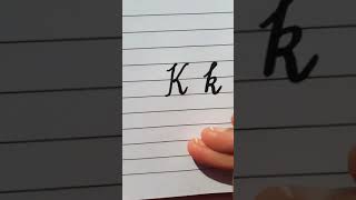 How to write K letter in Cursive Writing.