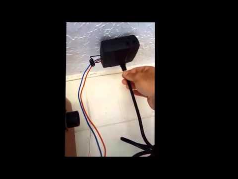 Gate1® Remote transmitter kit installed on a Liftmaster garage opener