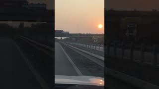 sunset time on the way #hindisong #sunsetview #roadtrip #trendingvideo #travel #highway #shortvideo