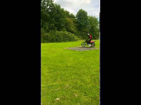 XL 125 Honda hitting some jumps
