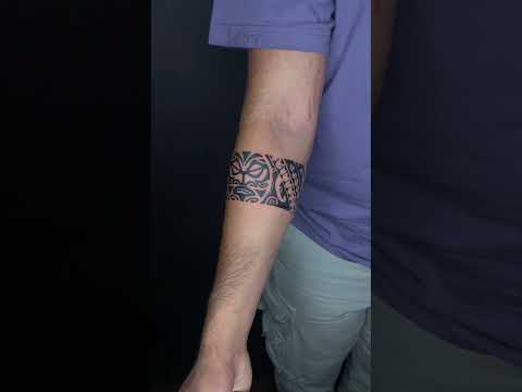 Stunning Tribal Band Tattoo | Bold & Intricate Arm Design