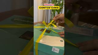 Unboxing an almond cake! #asmr #unboxing #contis #almond #sanarival #shorts #fyp #happyminds