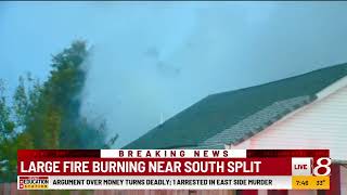 Large garage fire under control near South Split